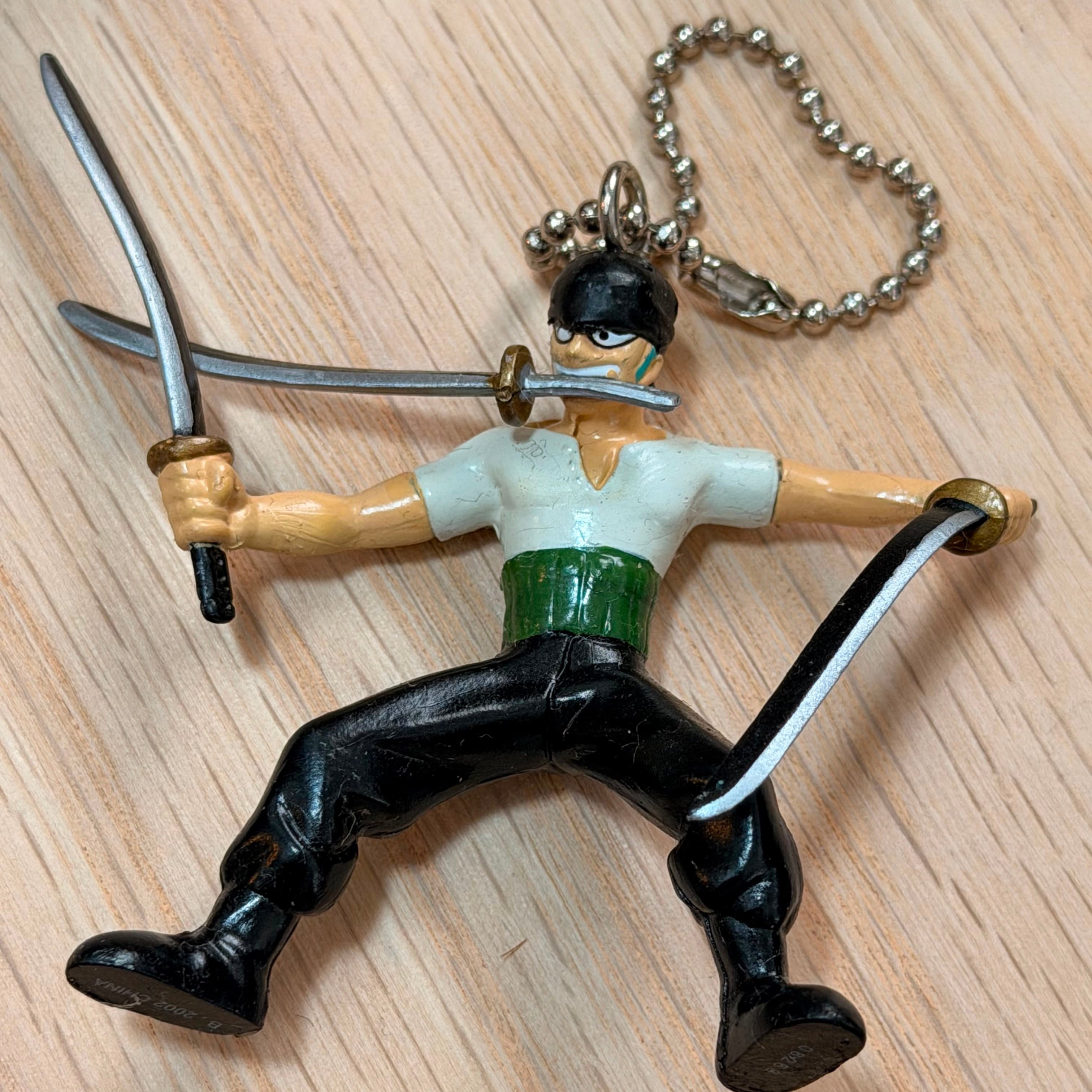 One Piece Zoro mini figurine keychain by Bandai
